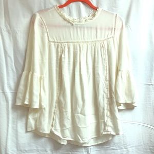 Ivory long-sleeve ruffled top